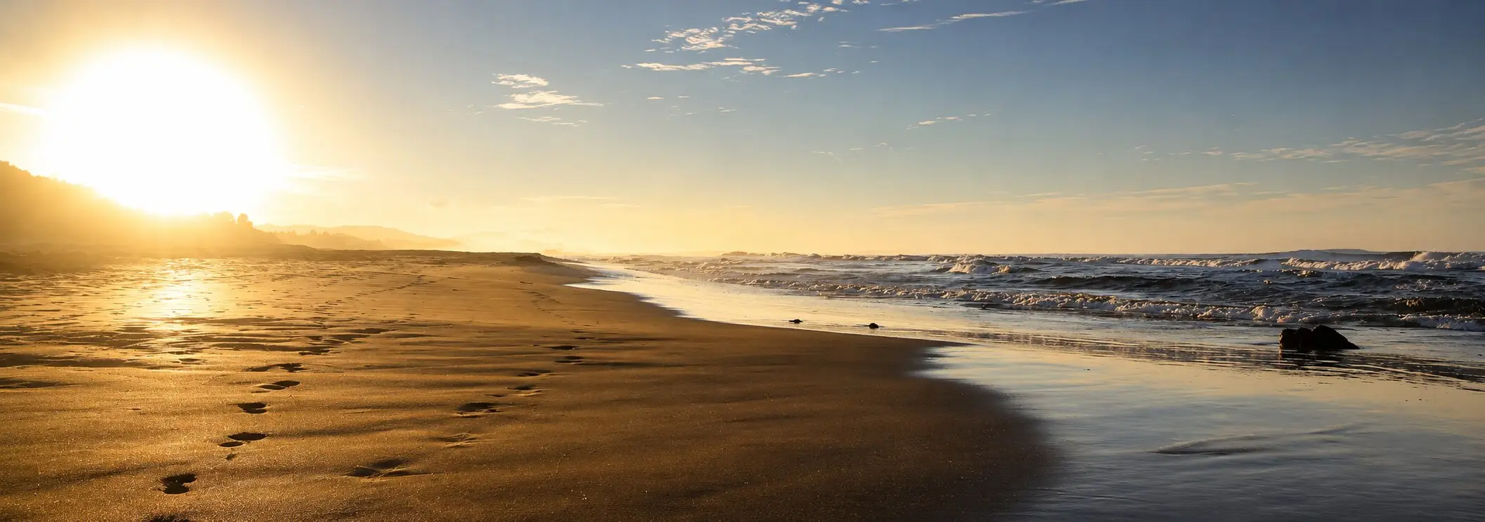 Sunrise footprints on Troncones beach